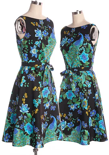 Monique Dress Peacock in Emerald